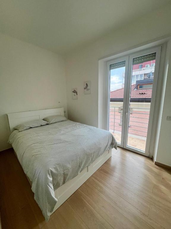 Giường trong phòng chung tại La Piccola Sforza - Unterkunft mitten im Herzen Bergamos!