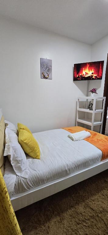 Ένα ή περισσότερα κρεβάτια σε δωμάτιο στο Delsy Stays