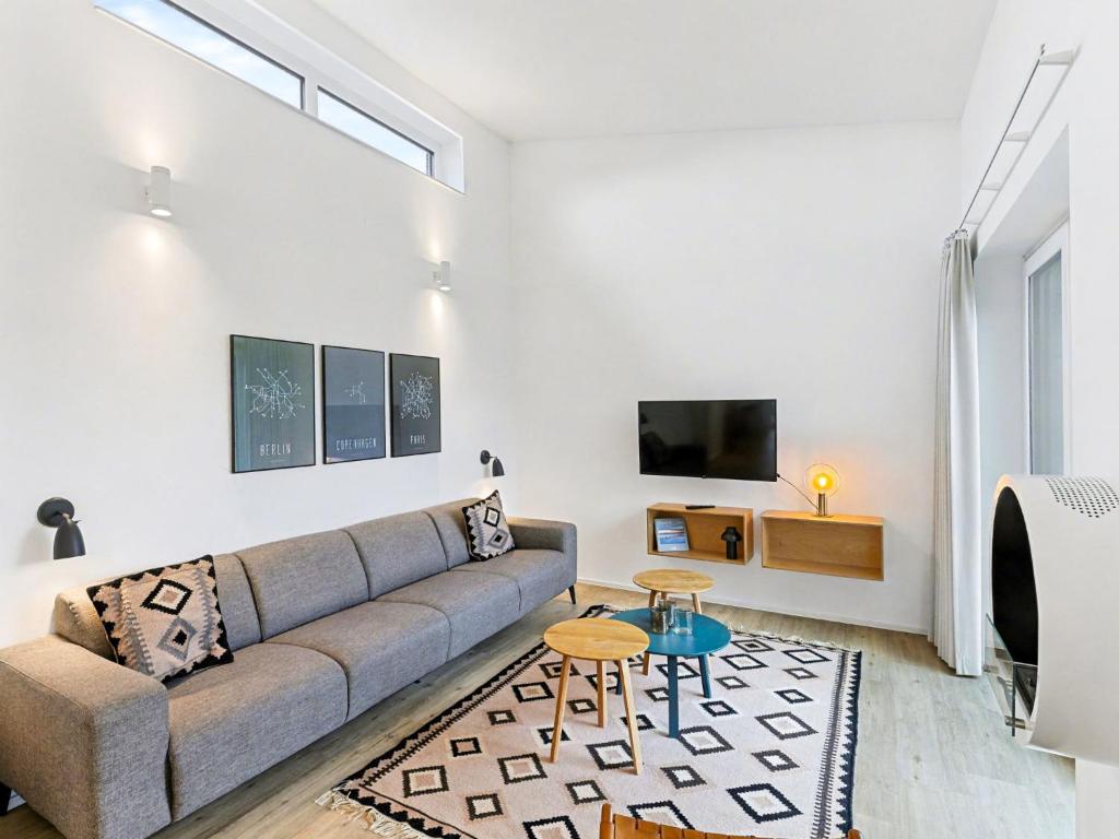 Μια τηλεόραση ή/και κέντρο ψυχαγωγίας στο Holiday Home Küstenzauber by Interhome