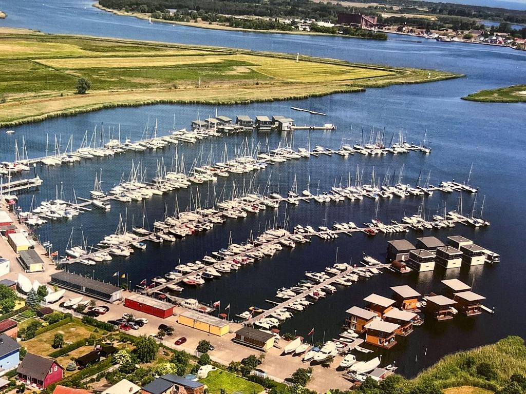 an aerial view of a marina with boats in the water at Kröslin Apartments in Kröslin