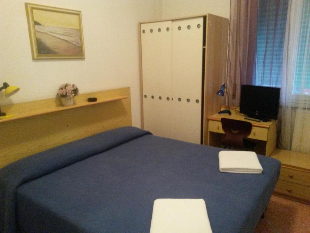 Postel nebo postele na pokoji v ubytování Hotel Bel Sit