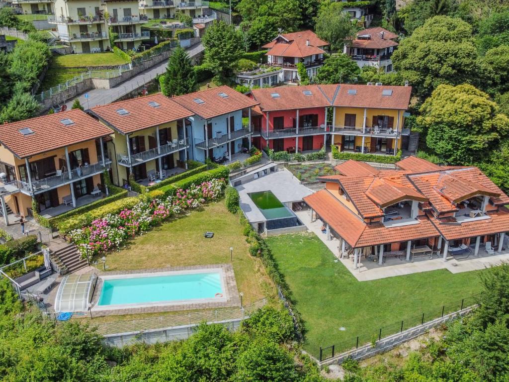 an aerial view of a house with a swimming pool at Apartment Borgo Castello-9 by Interhome in Argegno