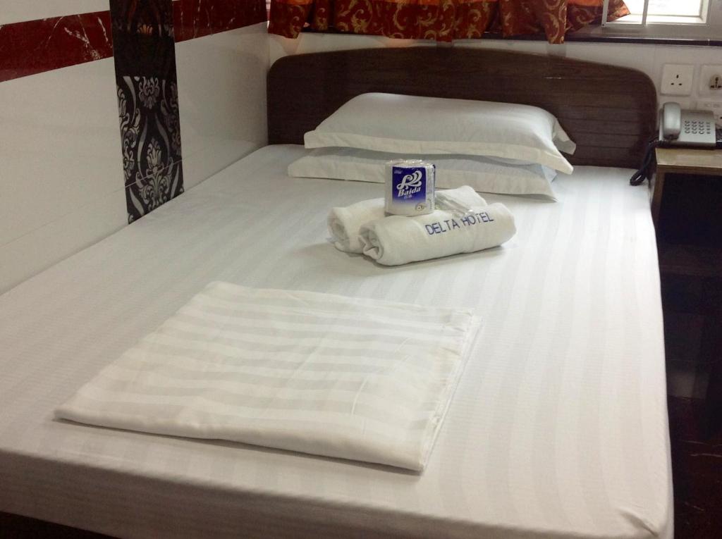 Postel nebo postele na pokoji v ubytování Woodstock Hostel
