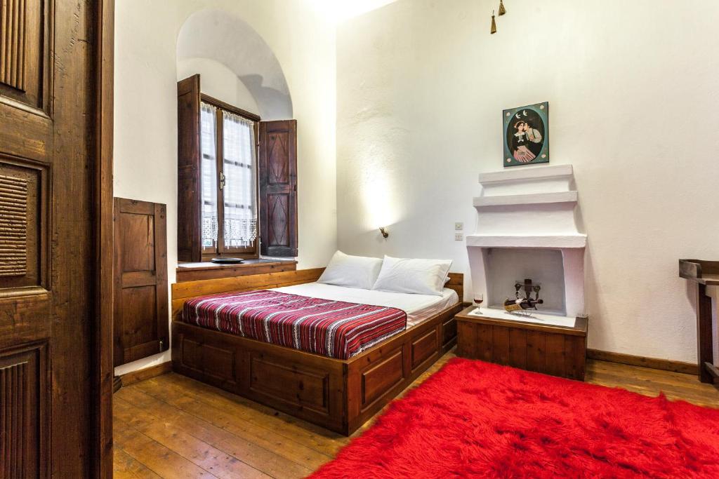 Postel nebo postele na pokoji v ubytování Archontiko Filippidi