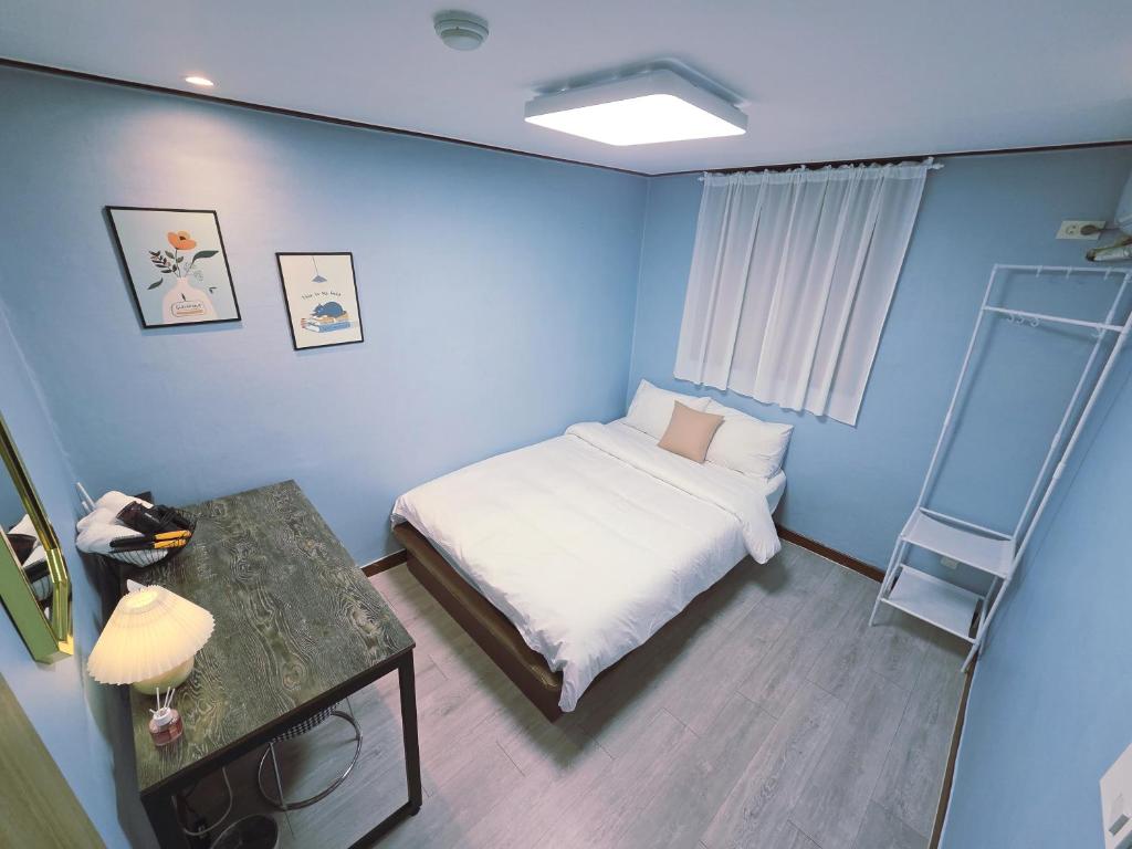 Postel nebo postele na pokoji v ubytování stayaroma