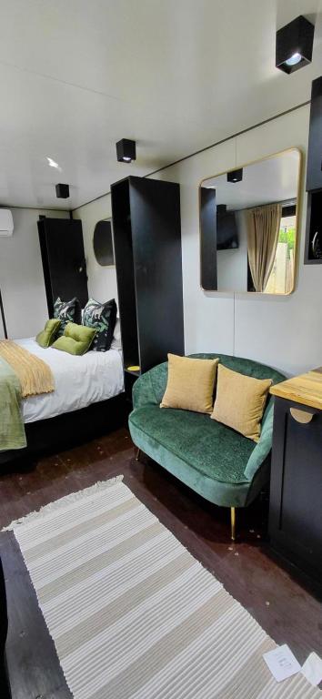 Ένα ή περισσότερα κρεβάτια σε δωμάτιο στο Stacey's Mini Hideaway