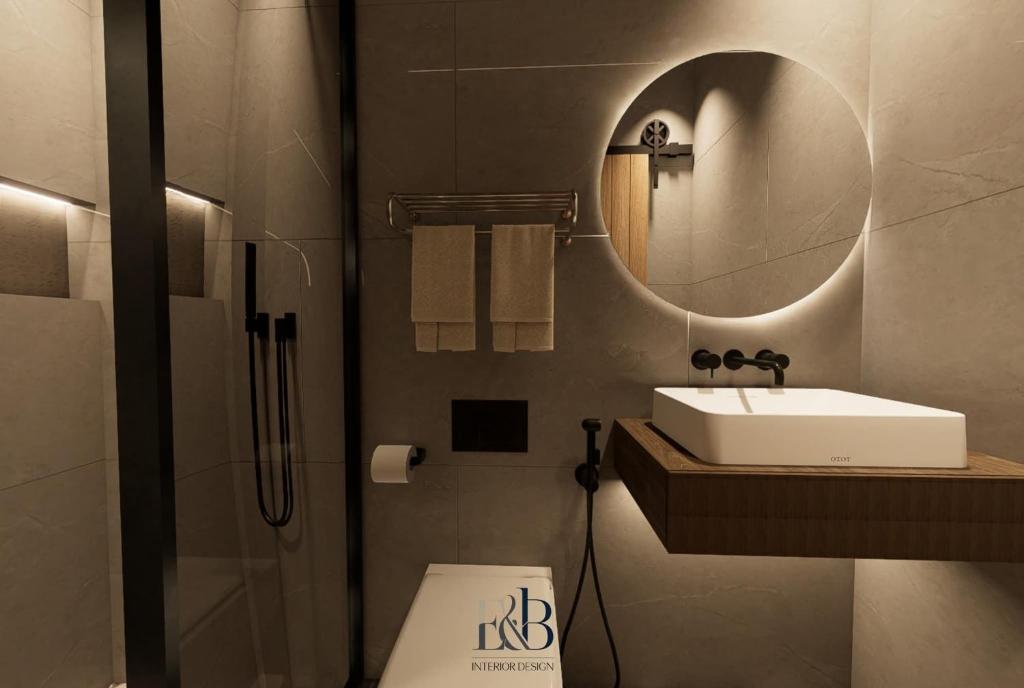 a bathroom with a sink and a mirror and a toilet at Premium Unit in Maldives in Manila