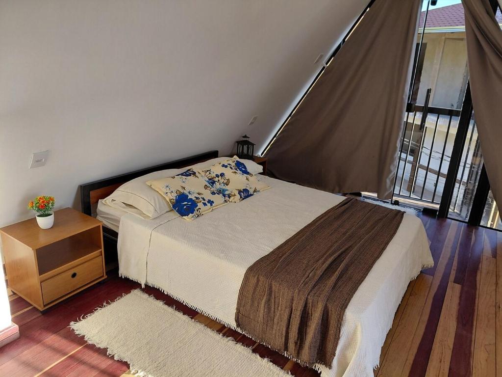 Postel nebo postele na pokoji v ubytování Chale Doce Refugio