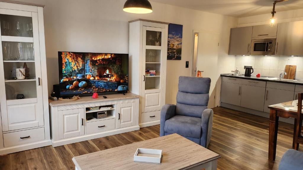 Posezení v ubytování Ferienwohnung FeWo Plaggenburg- die Kleine große