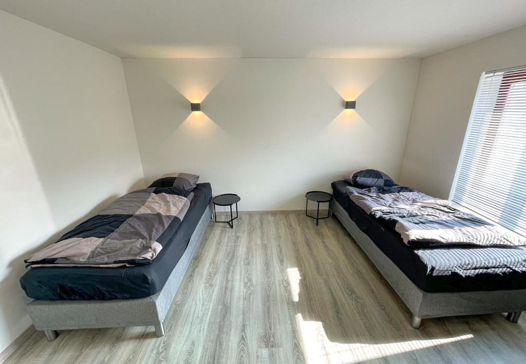 Postel nebo postele na pokoji v ubytování 78-4 - Luxe appartement met havenuitzicht