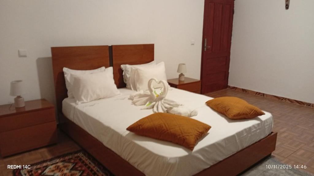 Ένα ή περισσότερα κρεβάτια σε δωμάτιο στο Pensão restauração horizonte