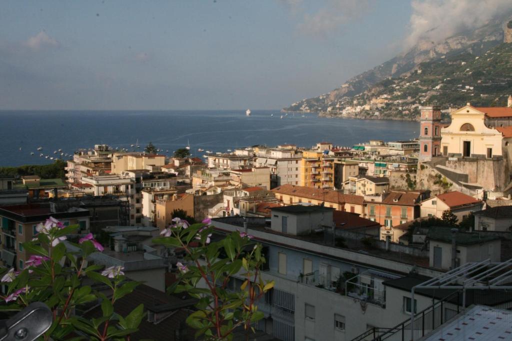 a city with a view of the water and buildings at Casa Clotide in Maiori