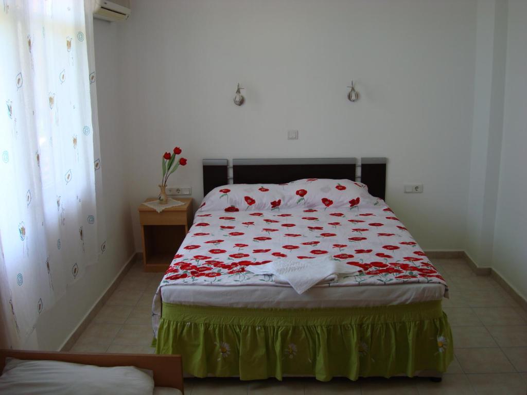 Postel nebo postele na pokoji v ubytování Hotel Uygar