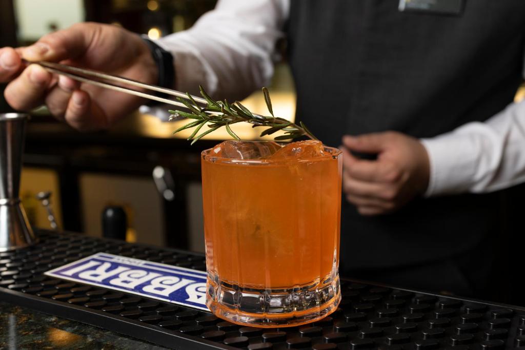 a drink sitting on top of a table at InterContinental Madrid by IHG in Madrid