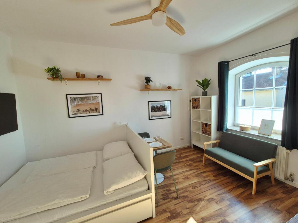 Ένα ή περισσότερα κρεβάτια σε δωμάτιο στο Studio 2 - Apartments am Schloss