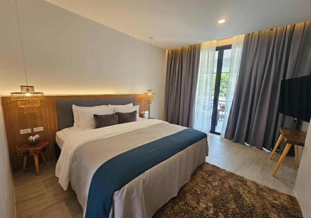 Postel nebo postele na pokoji v ubytování la la lay beach house