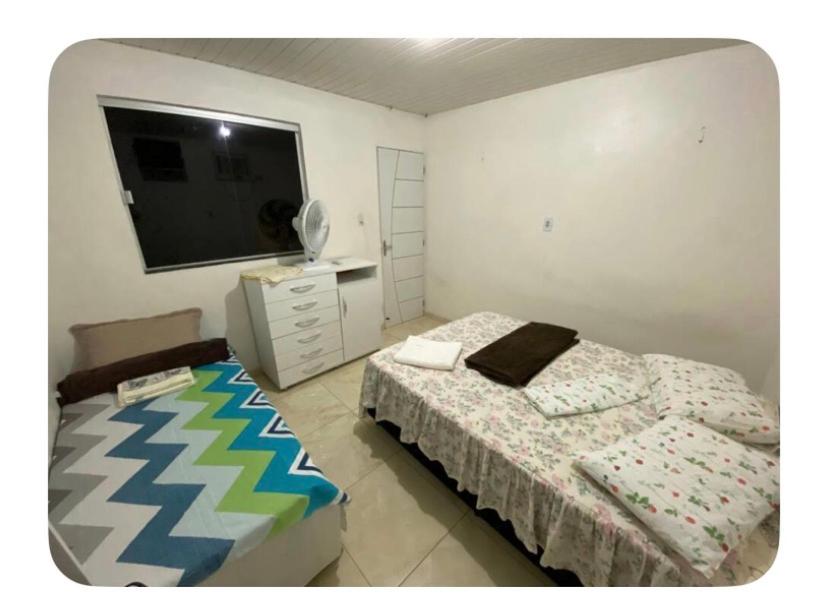 Postel nebo postele na pokoji v ubytování Casa familiar