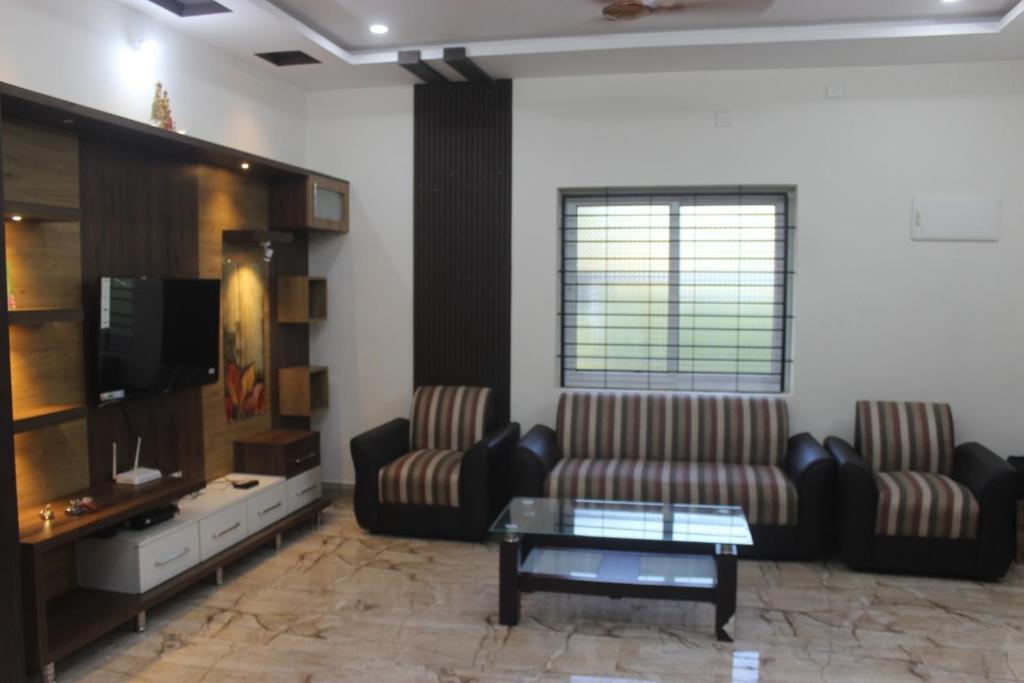 Χώρος καθιστικού στο Cozy Villa