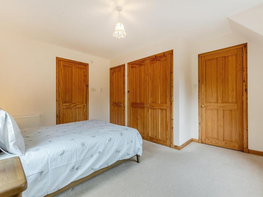 Ένα ή περισσότερα κρεβάτια σε δωμάτιο στο Bridge House