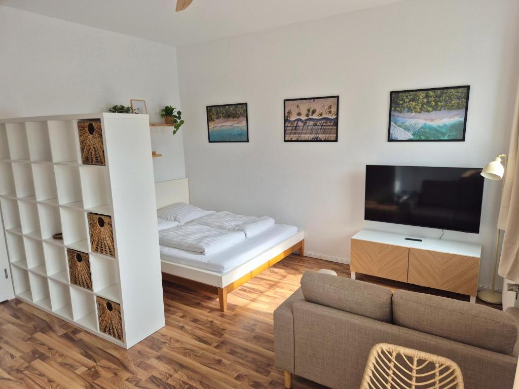 Μια τηλεόραση ή/και κέντρο ψυχαγωγίας στο Studio 3 - Apartments am Schloss