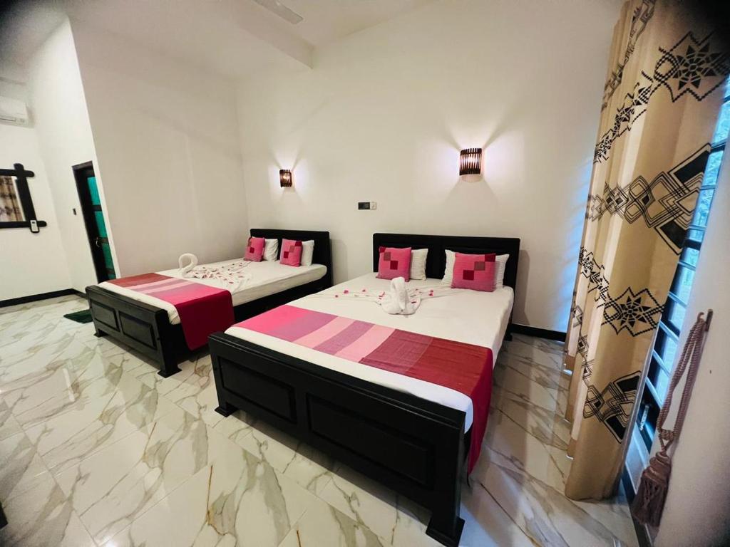 Postel nebo postele na pokoji v ubytování Banana Leaf Resort