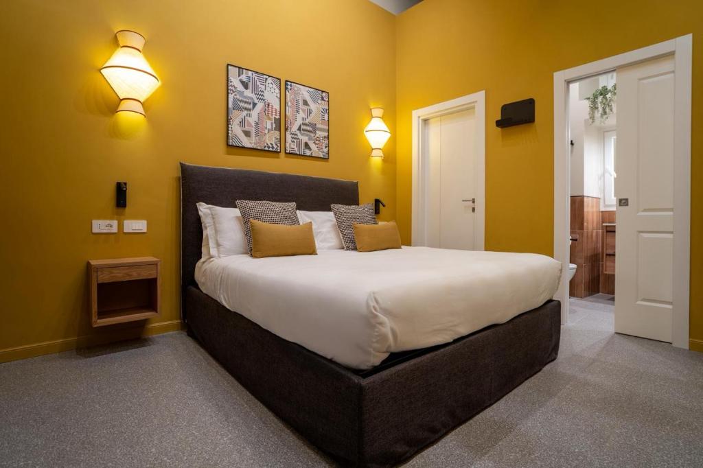 Postel nebo postele na pokoji v ubytování Maison Luxury Plaza