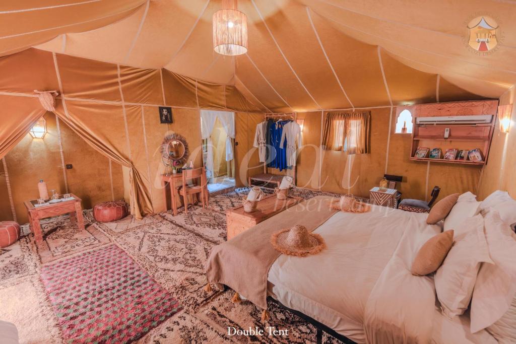 Ένα ή περισσότερα κρεβάτια σε δωμάτιο στο Bafana Desert Camp