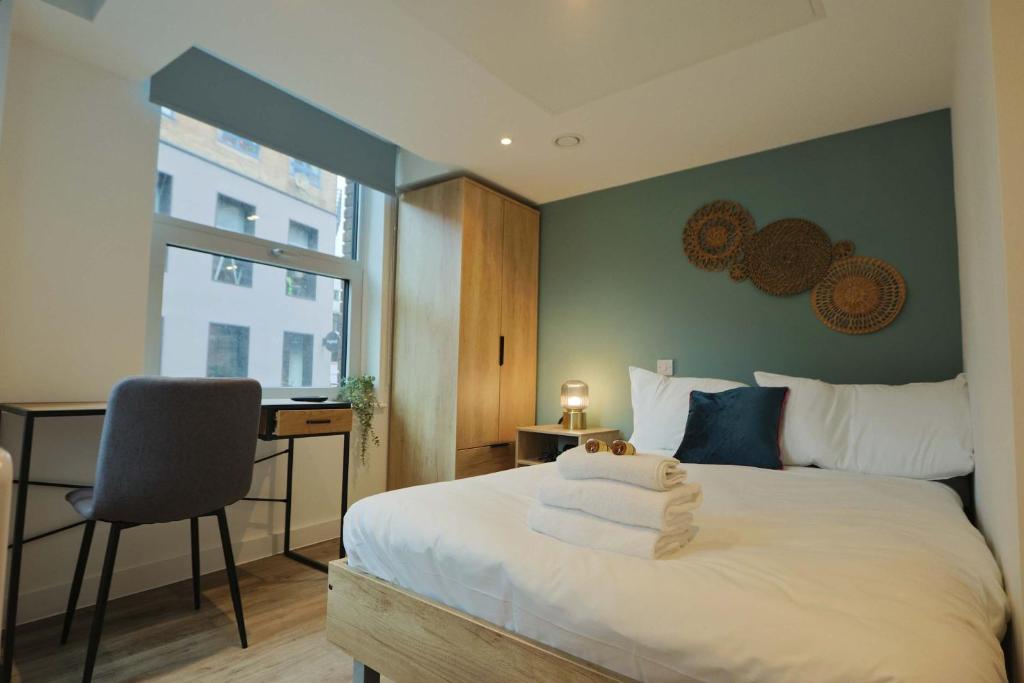 Ένα ή περισσότερα κρεβάτια σε δωμάτιο στο Studio Flat Close to Queen Square - Flat 3A