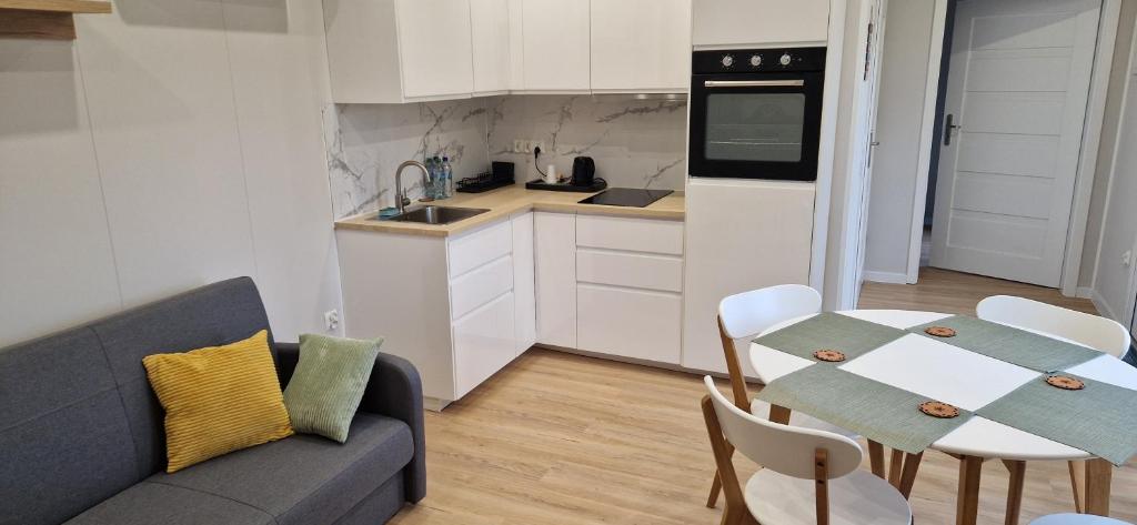 Kuchyň nebo kuchyňský kout v ubytování Biały Fortepian