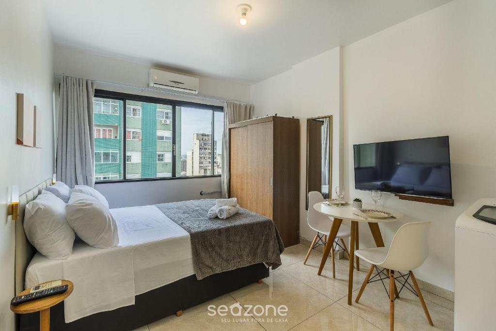 Ένα ή περισσότερα κρεβάτια σε δωμάτιο στο Estúdio no Centro Histórico de PoA | CCF1410