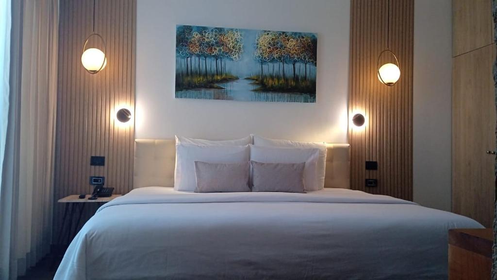 Ліжко або ліжка в номері Hotel La Isla