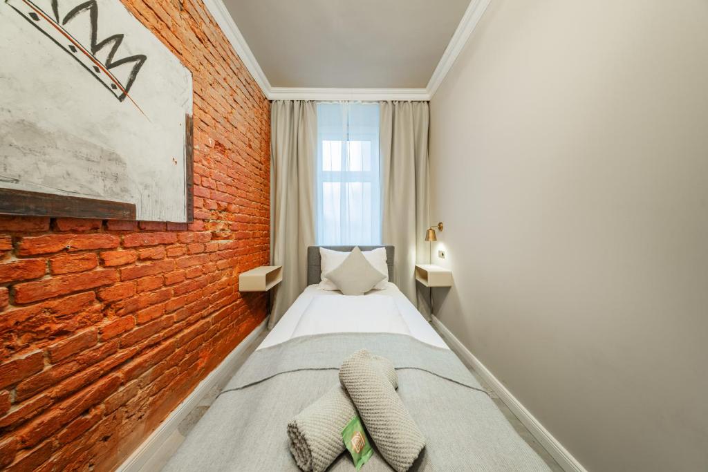 Postel nebo postele na pokoji v ubytování HOME1 - Bloom Boutique Hostel