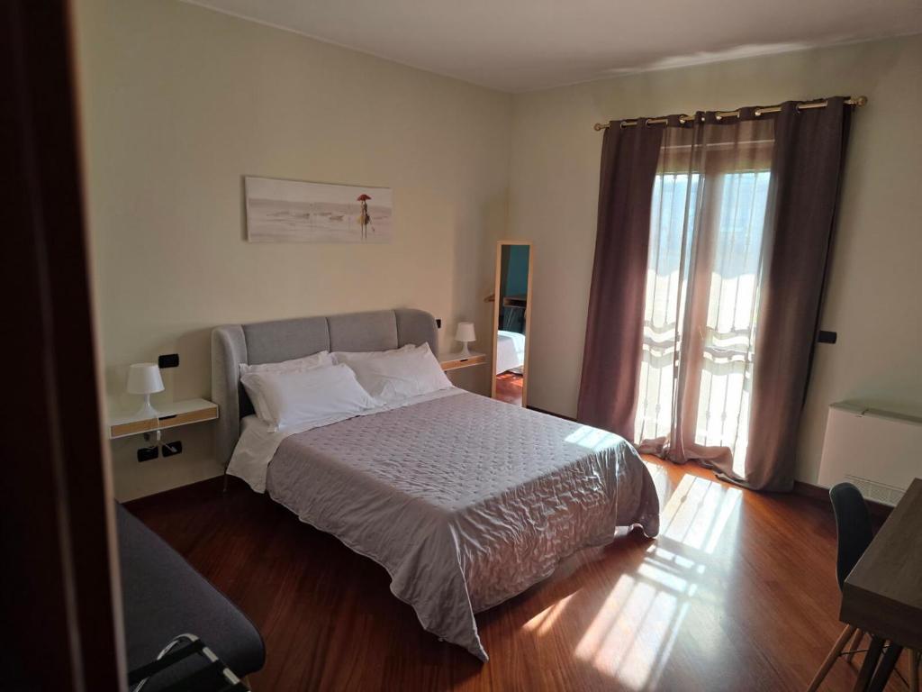 Postel nebo postele na pokoji v ubytování Villa Cristina