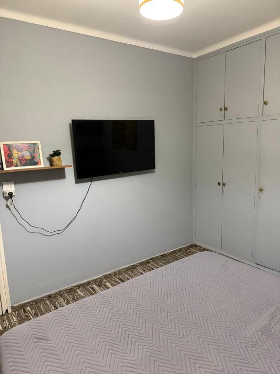 TV a/nebo společenská místnost v ubytování Casa