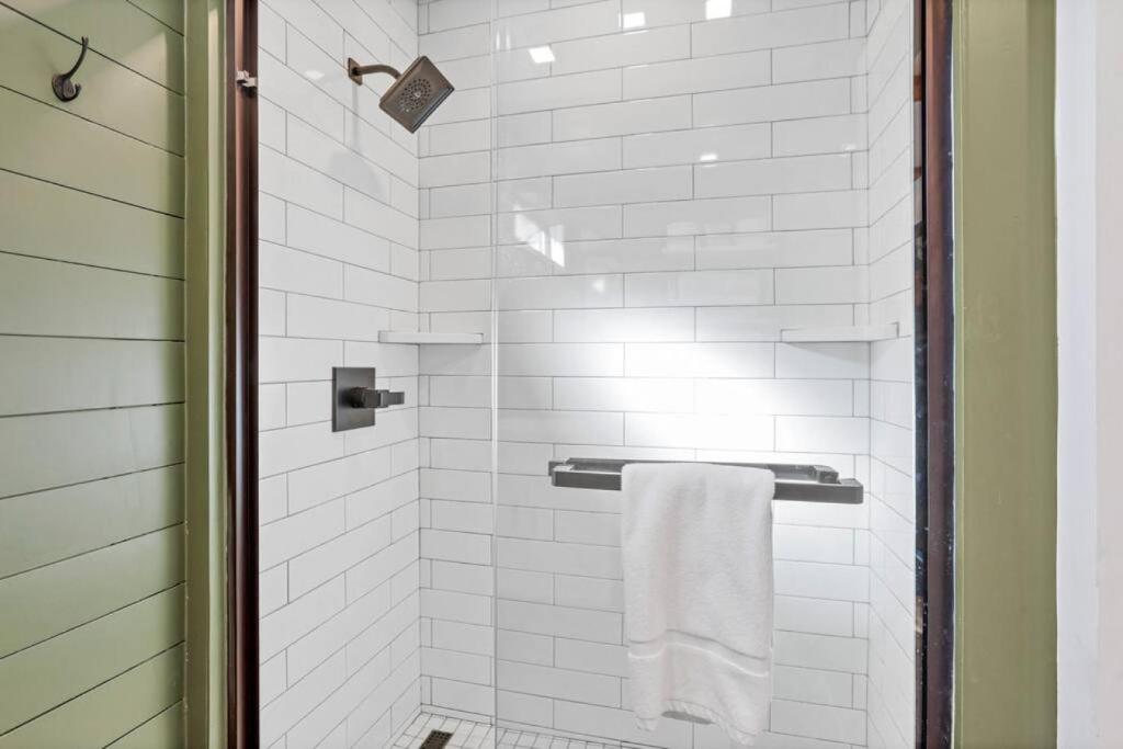 a bathroom with a shower with a white towel at Hiltop Haven The Top Deck in Rockbridge