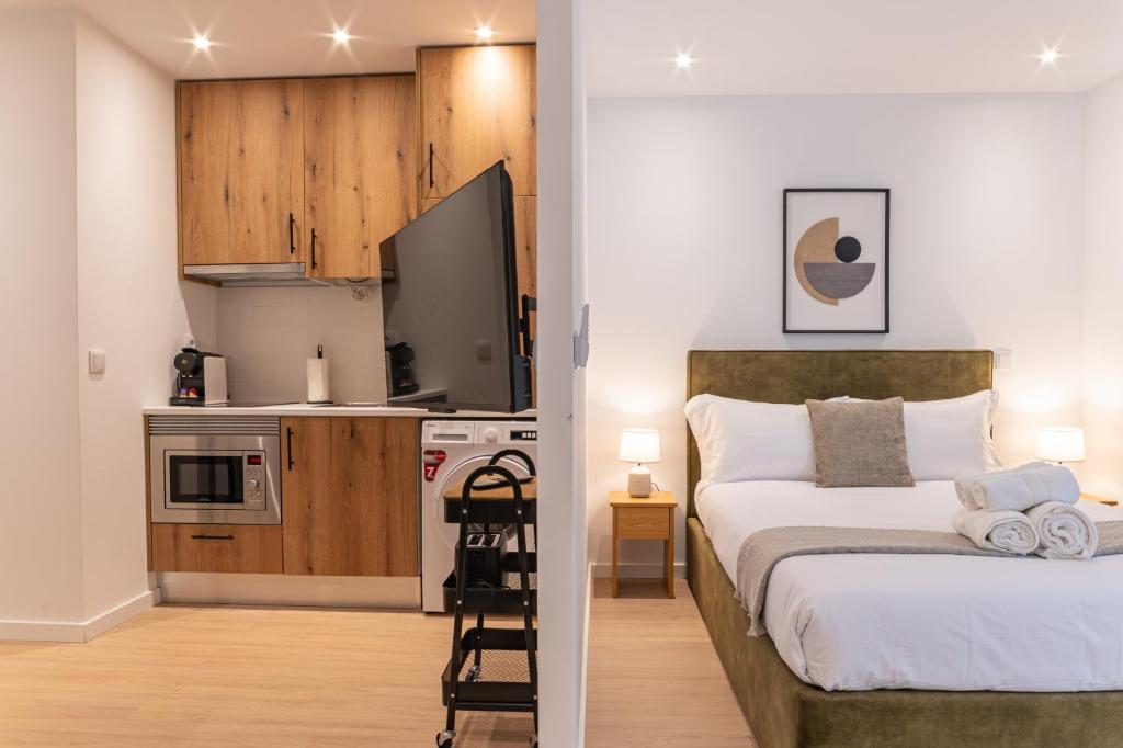 Kuchyň nebo kuchyňský kout v ubytování Campolide Charming Studios & Apartments