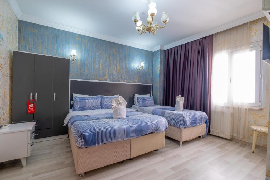 Postel nebo postele na pokoji v ubytování Istanbul Oldcity Apart