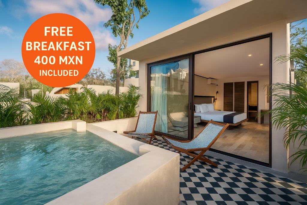 a villa with a swimming pool with a sign that reads free breakfast at Collection O Faisano Boutique Luxury Hotel, Tulum Beach in Tulum