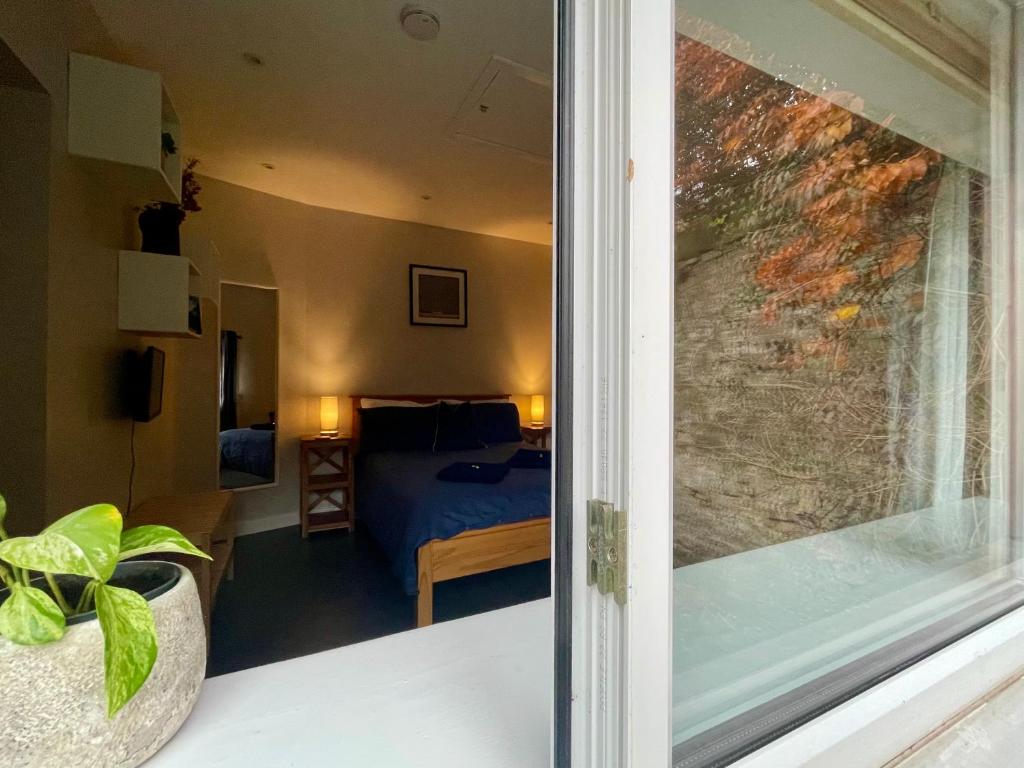 a view of a bedroom from a window at The Wedale Bothy in Stow