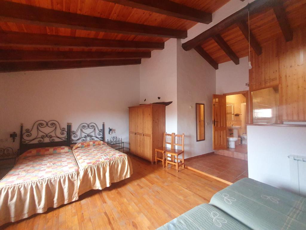 Postel nebo postele na pokoji v ubytování Cielos de Celadas