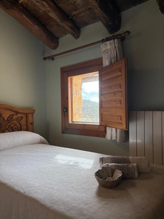 Postel nebo postele na pokoji v ubytování La Ontina Alojamientos Rurales