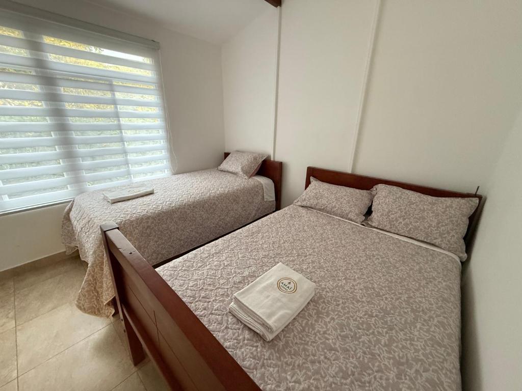 Ένα ή περισσότερα κρεβάτια σε δωμάτιο στο Amai Lodge