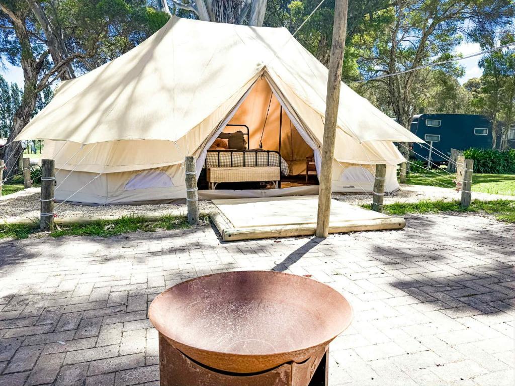 a large tent with a table in front of it at Penola Coonawarra Caravan Park in Penola