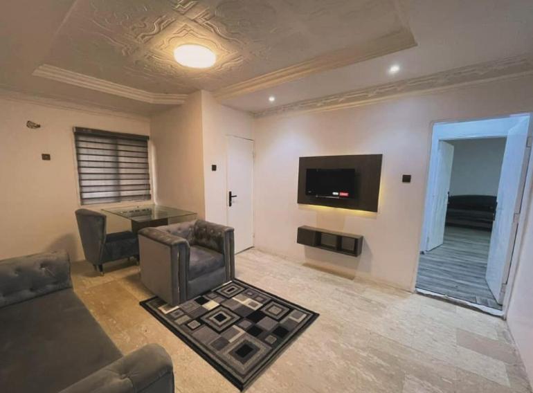 TV a/nebo společenská místnost v ubytování IlewaLekkiLagos