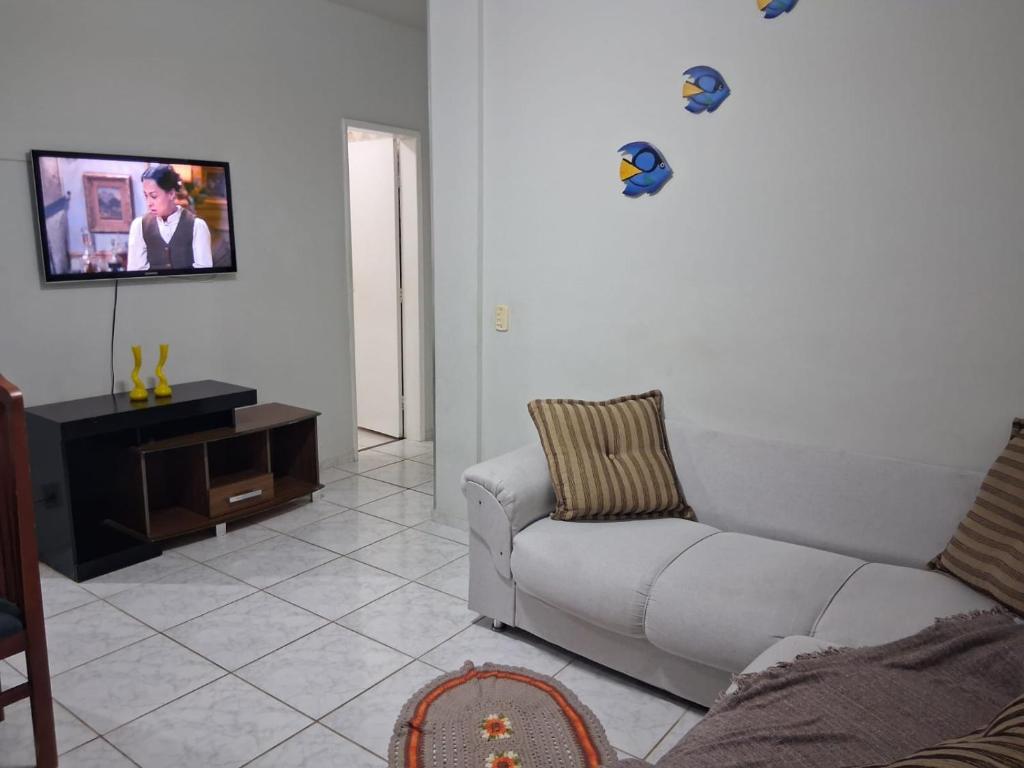 Et tv og/eller underholdning på Espaço Praia do Morro