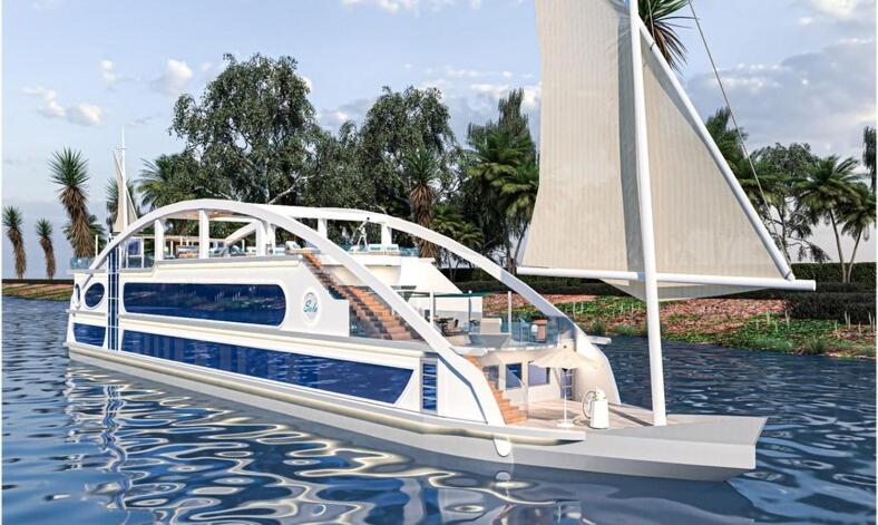 un barco blanco con una vela en el agua en Sola Dahabiya Nile Cruise Every Monday from Luxor to Aswan 4 nights and Every Friday from Aswan to Luxor 3 nights, en Luxor