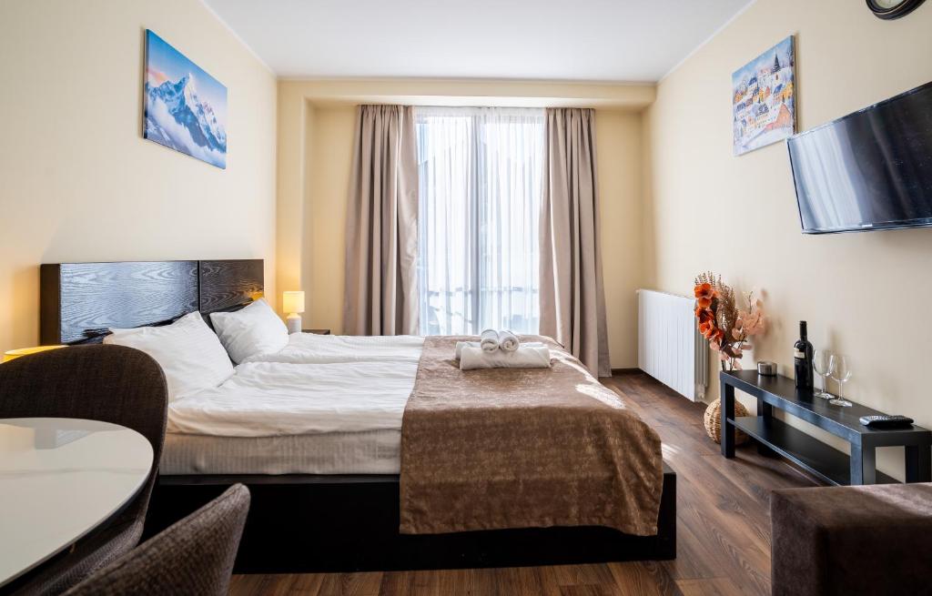 Ένα ή περισσότερα κρεβάτια σε δωμάτιο στο Stylish Stay at Loft 1 in New Gudauri