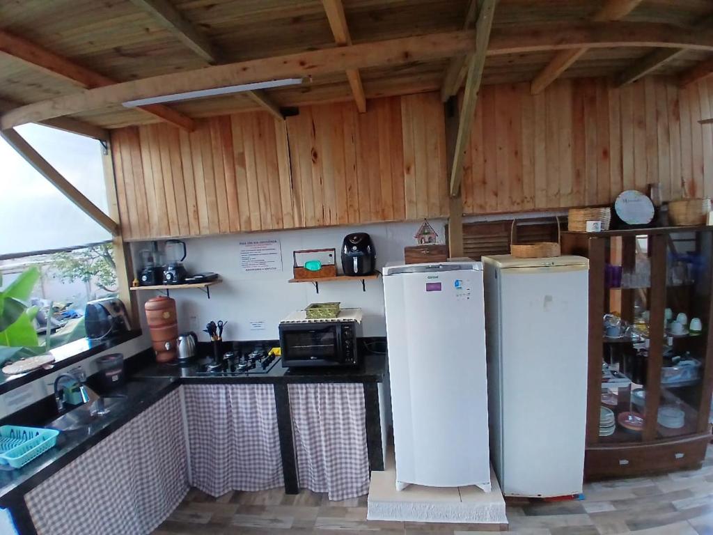 Küche/Küchenzeile in der Unterkunft Cabanas LA CASITA BRISA DO MAR