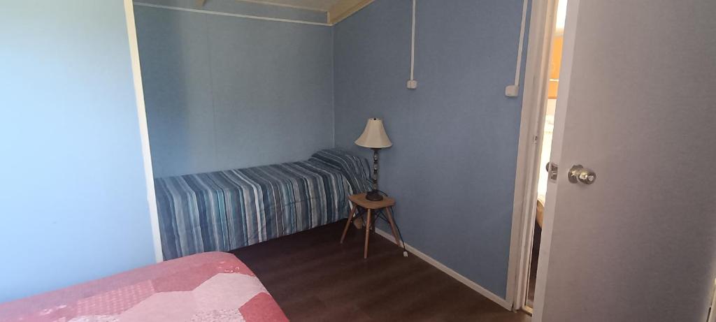 Ένα ή περισσότερα κρεβάτια σε δωμάτιο στο Cabaña Liam Emilio