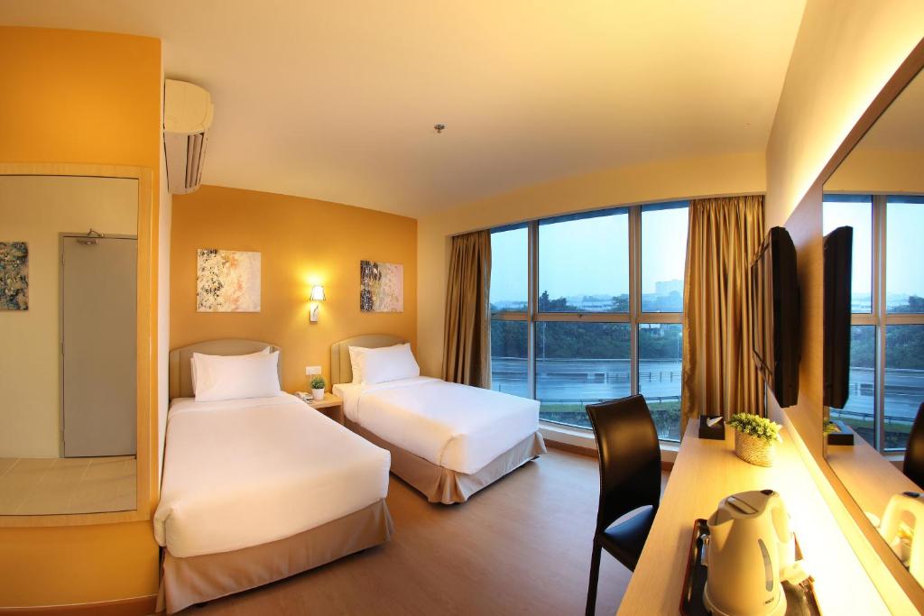 Postel nebo postele na pokoji v ubytování Hotel Min Cott